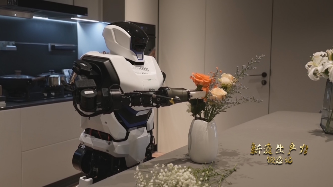 人形機(jī)器人插花。