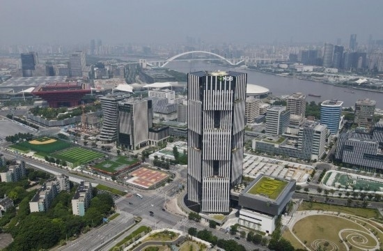 位于中國(guó)上海浦東新區(qū)世博園區(qū)的金磚國(guó)家新開發(fā)銀行總部大樓（2022年6月17日攝，無人機(jī)照片）。新華社記者方喆攝